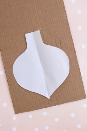 A paper shape on cardboard