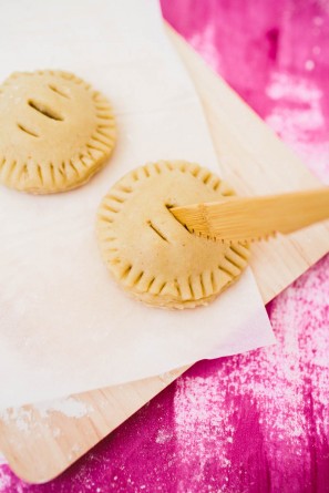 Someone making mini pies
