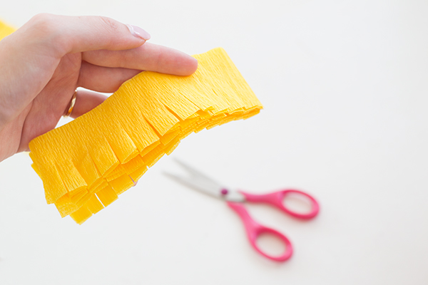 Yellow paper and scissors