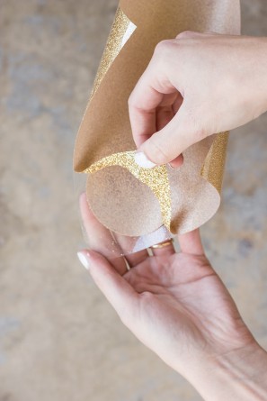 Someone peeing a gold material