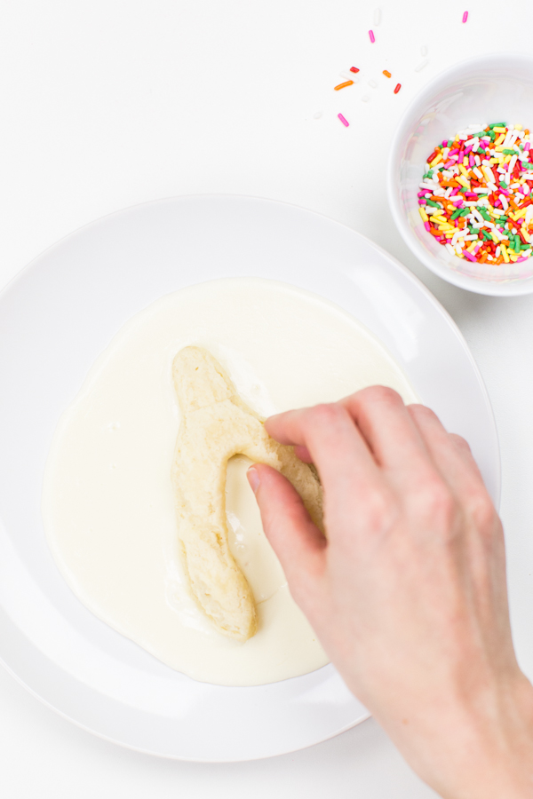 Wishbone donut and bowl of sprinkles