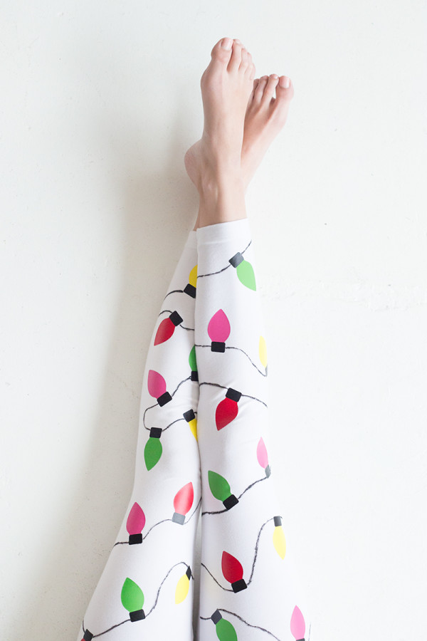 Someone wearing Christmas light leggings