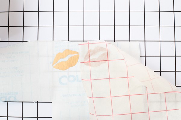 Paper and gold lip print