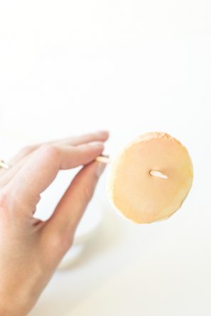 Someone poking a stick through a pancake 