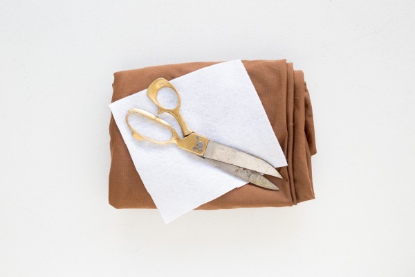 Brown fabric with scissors
