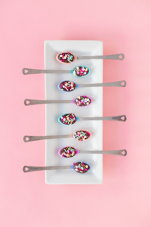 Spoons with desserts on it