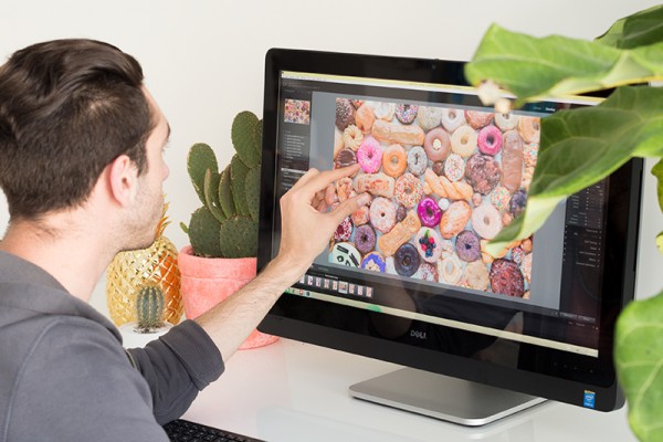 Someone touching a computer screen