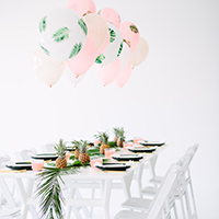 A “Palm Fronds + Bon Bons” Dinner Party