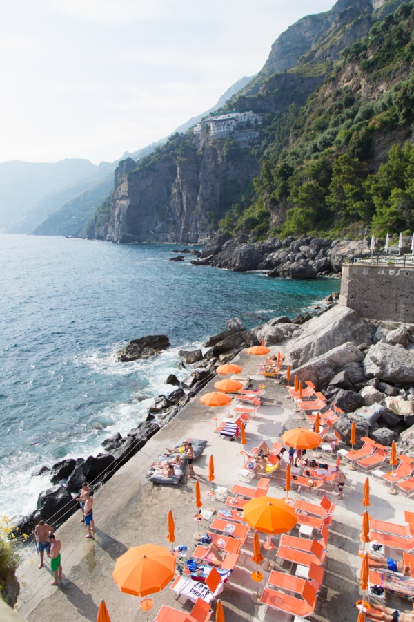 Beach with orange umbrellas