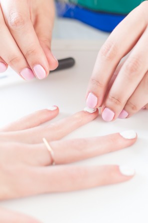 Someone painting their nails