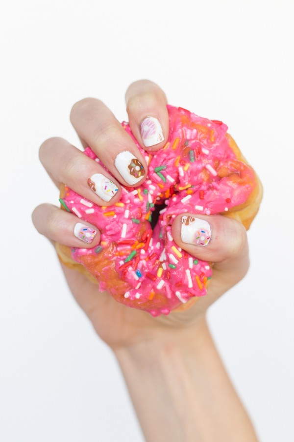 Someone holding a donut