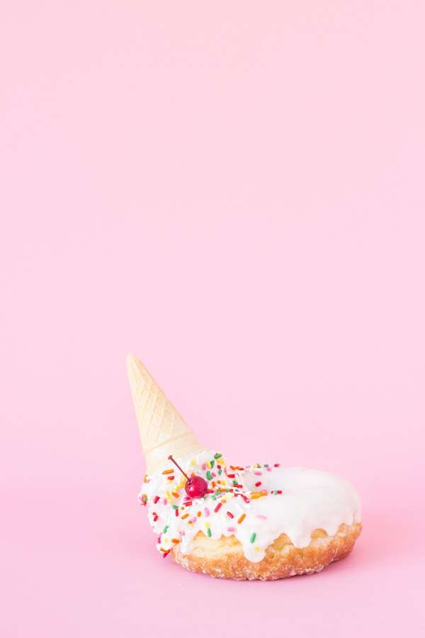 A donut with an ice cream cone in it