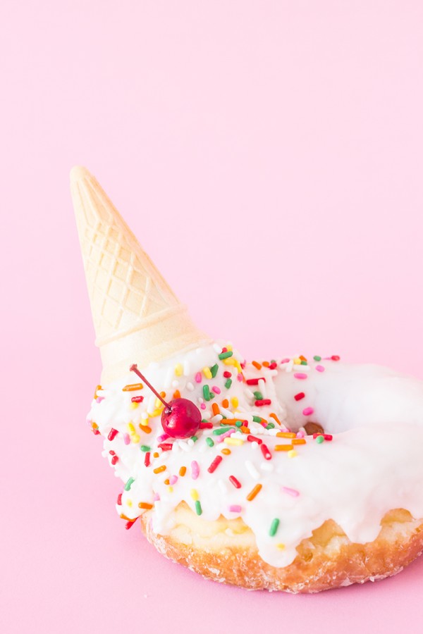 A donut with an ice cream cone in it