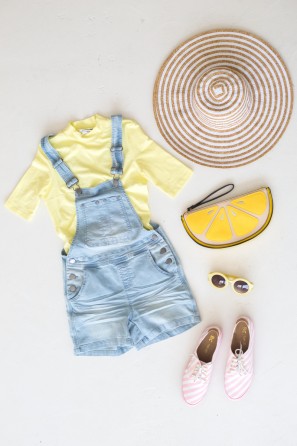Overalls and a yellow shirt
