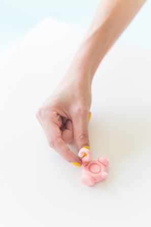 Someone holding clay