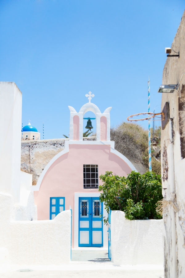 A pink building with blue doors