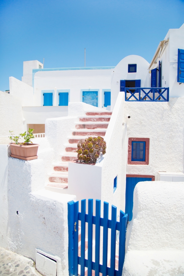 White building with blue doors and windows