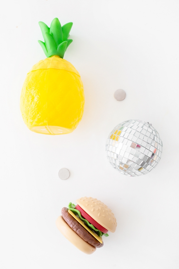 A fake pineapple and discoball