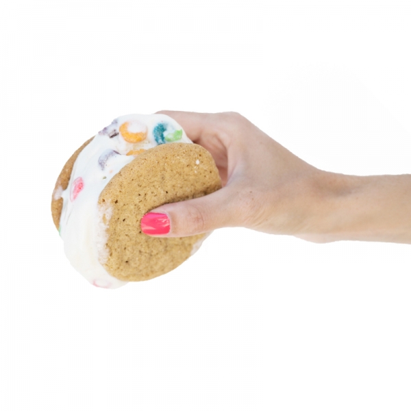 Someone holding an ice cream sandwich