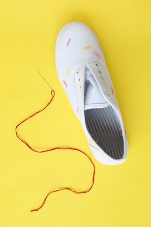 White sneakers and red string