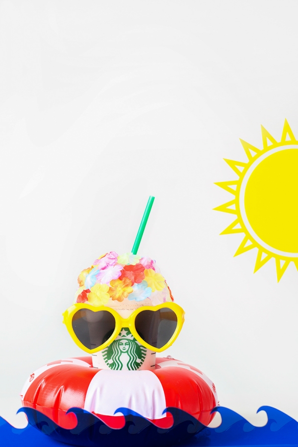 Starbucks drink with sunglasses on it