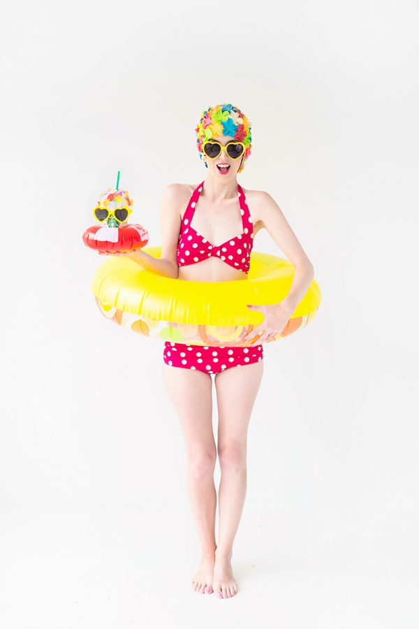 A woman wearing a polka dot bikini and shower cap