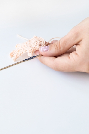 Someone sewing something 