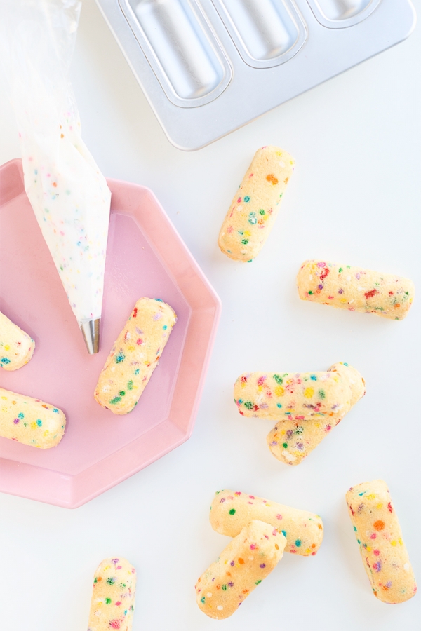 Rainbow twinkies on a pink plate