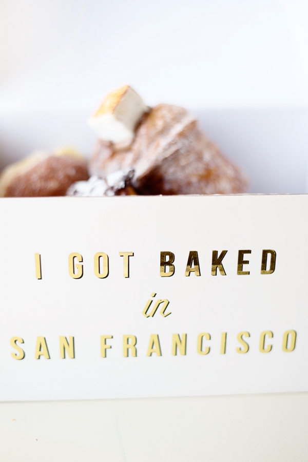 Pastries in a box that says \"I got baked in San Francisco\"