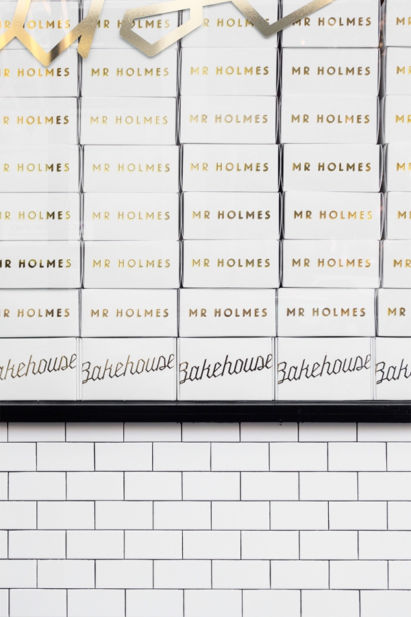 Stacks of boxes that say \"Mr. Holmes\" on them