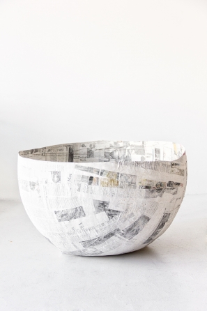 A ball with newspaper on it
