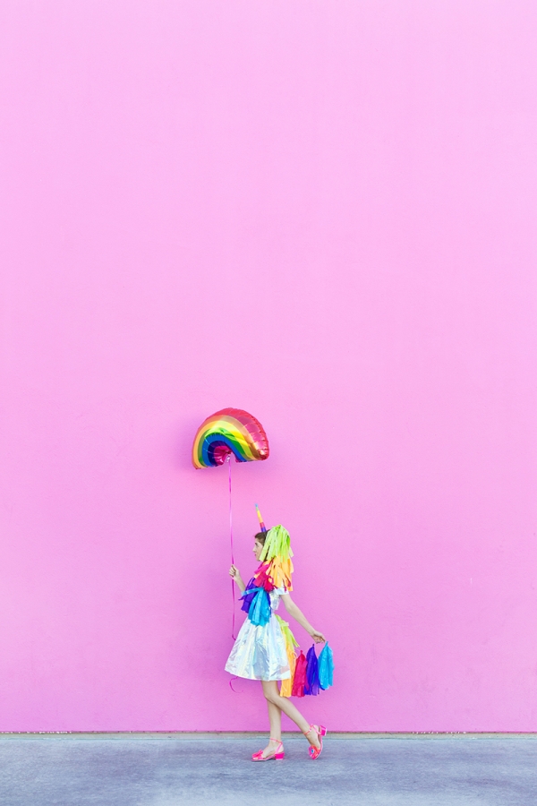 A woman dressed in a unicorn costume
