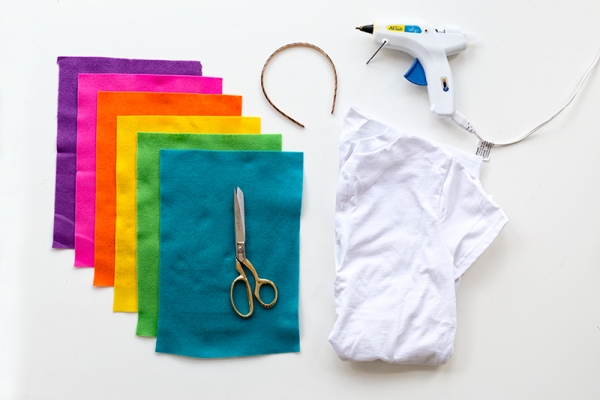 Rainbow papers, a shirt, and a glue gun