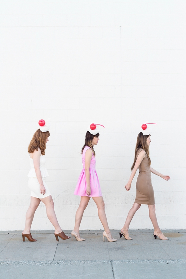 Three girls dressed in milkshake costumes