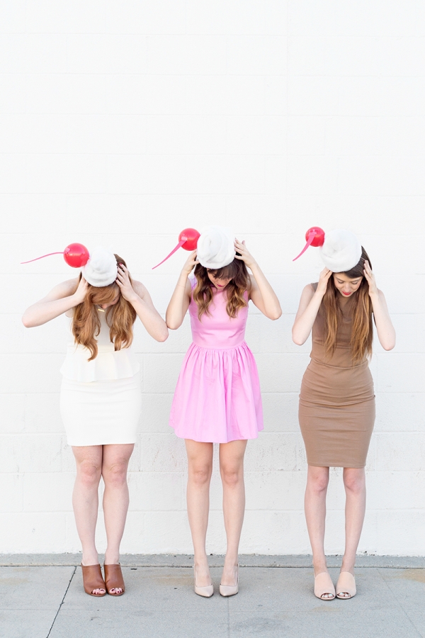 Three girls dressed in milkshake costumes