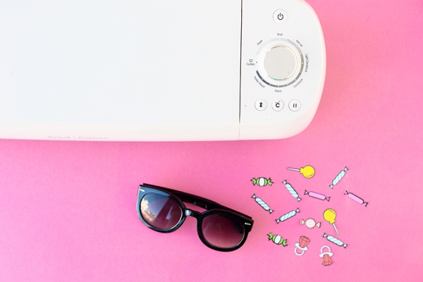Sunglasses, stickers, and a machine 