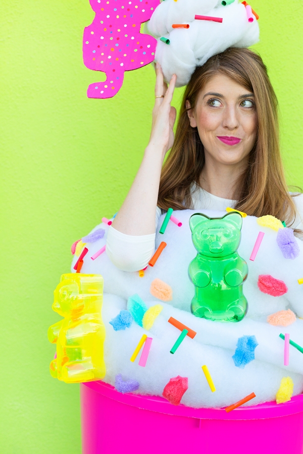 A woman dressed in a froyo costume