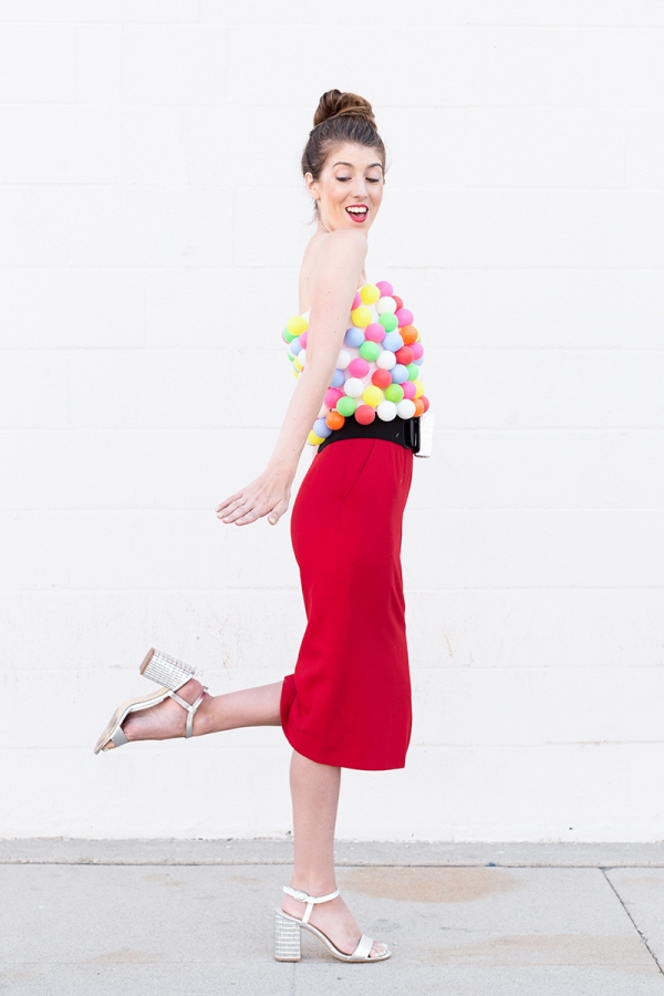 A woman dressed as a bubblegum machine