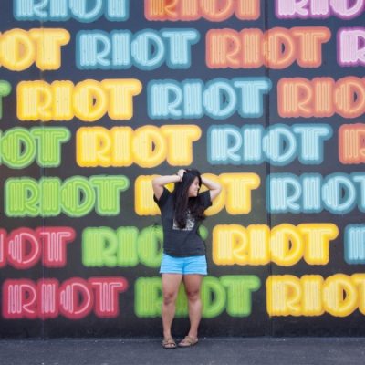 #StudioDIYWallCrawl: The Best Walls in NYC (Brooklyn + LES!) A woman standing in front of a colorful mural