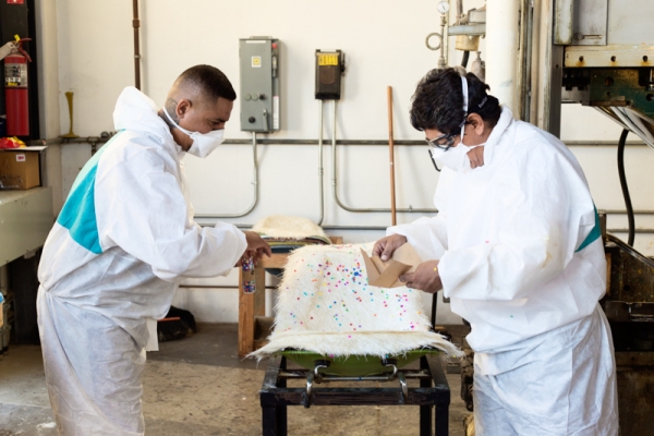 People working with fabric
