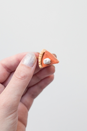 Someone holding a mini pie