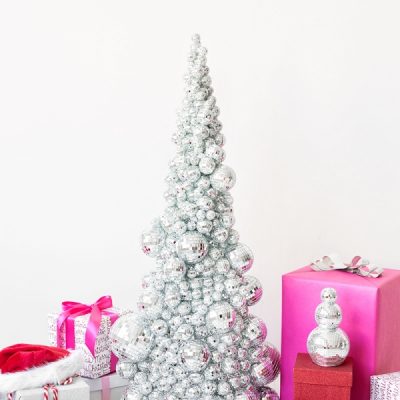 DIY Disco Ball Christmas Tree A silver Christmas tree and pink presents