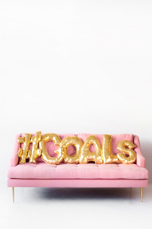 Gold balloons on the couch