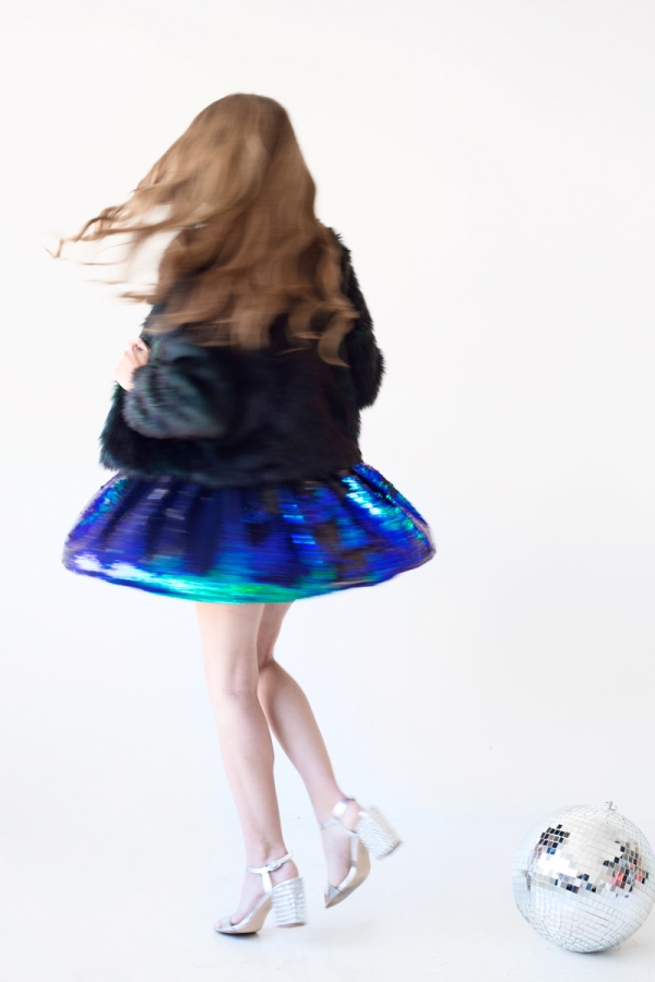 Someone spinning in a black dress