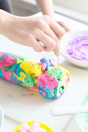 Rainbow yule log dessert