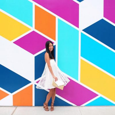 #StudioDIYWallCrawl: The Best Walls in Chicago A woman in front of a colorful wall