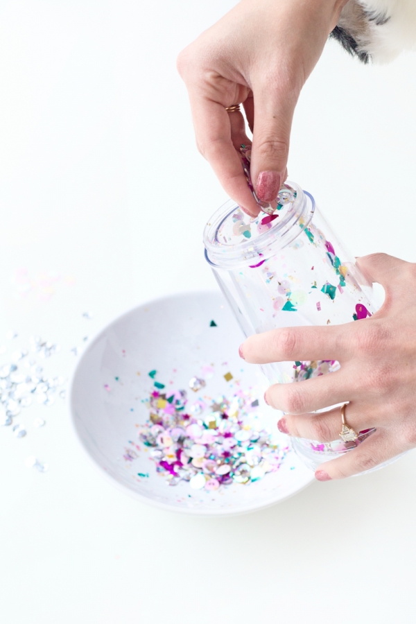 A cup with glitter on it