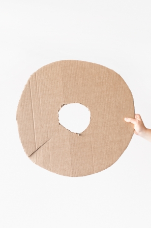 A cardboard circle shape