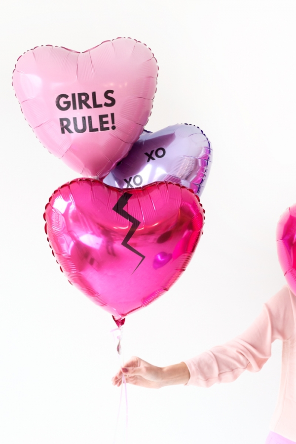 Pink and purple heart shaped balloons