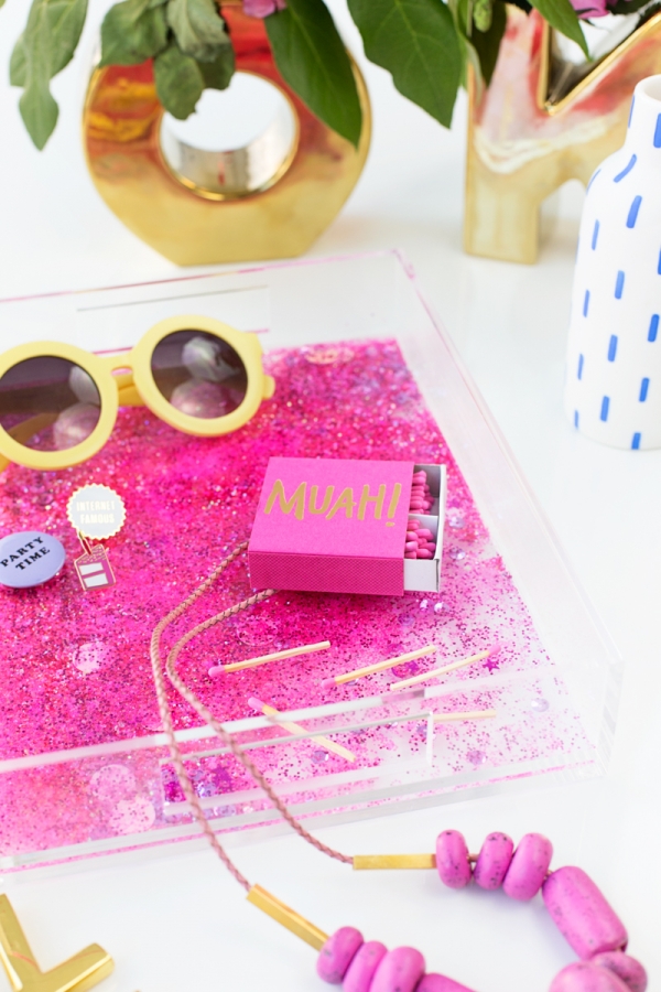 A plastic bag with pink glitter in it